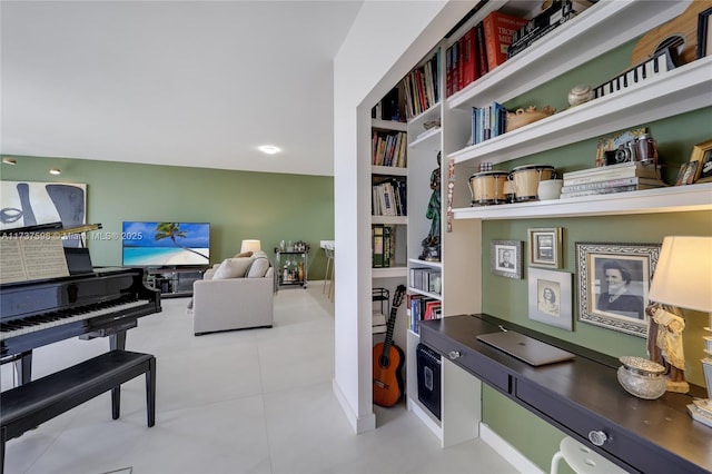 tiled home office with built in shelves and built in desk