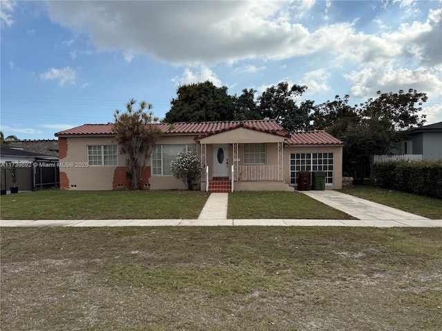 view of front facade with a front lawn