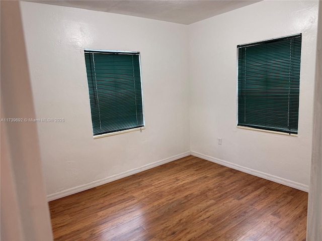 empty room featuring hardwood / wood-style floors