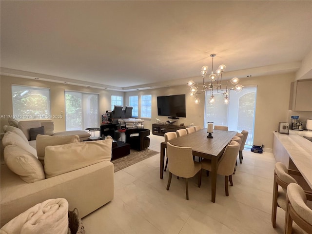 dining area featuring a chandelier