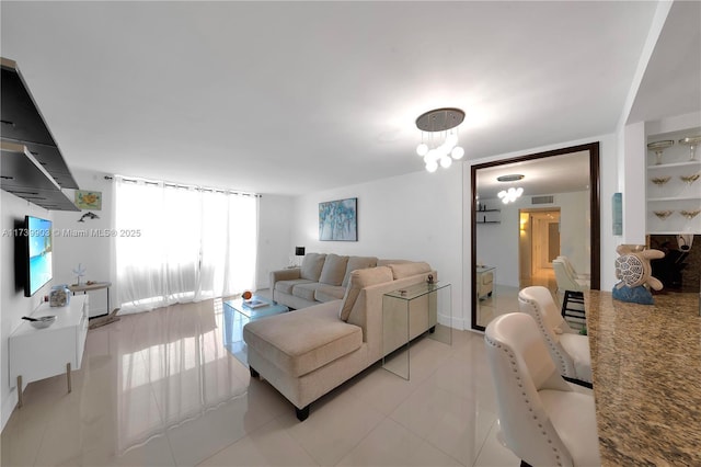 3750 NE 170th St Unit 101, North Miami Beach, FL 33160 - living area featuring light tile patterned floors
