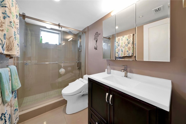 3750 NE 170th St Unit 101, North Miami Beach, FL 33160 - bathroom with a stall shower, vanity, toilet, and tile patterned flooring