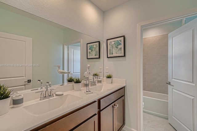 full bathroom featuring vanity, tile patterned floors, shower / bathtub combination, and toilet