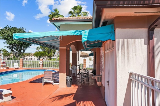 view of pool with a patio area