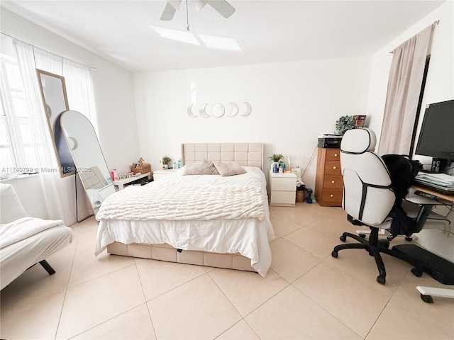 bedroom with light tile patterned flooring and ceiling fan