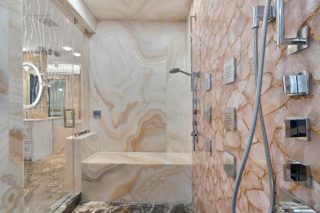 bathroom featuring a tile shower