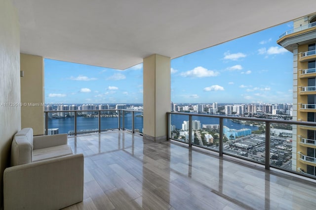 balcony featuring a water view