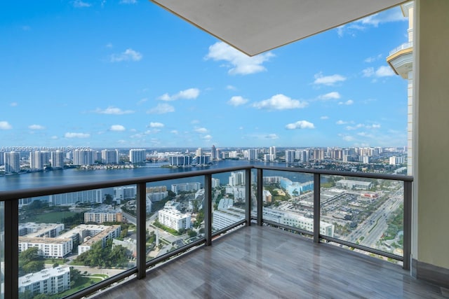 balcony featuring a water view