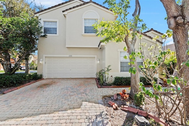 view of front of home with a garage