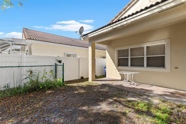 rear view of house with a patio area