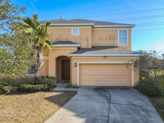 view of front of home with a garage