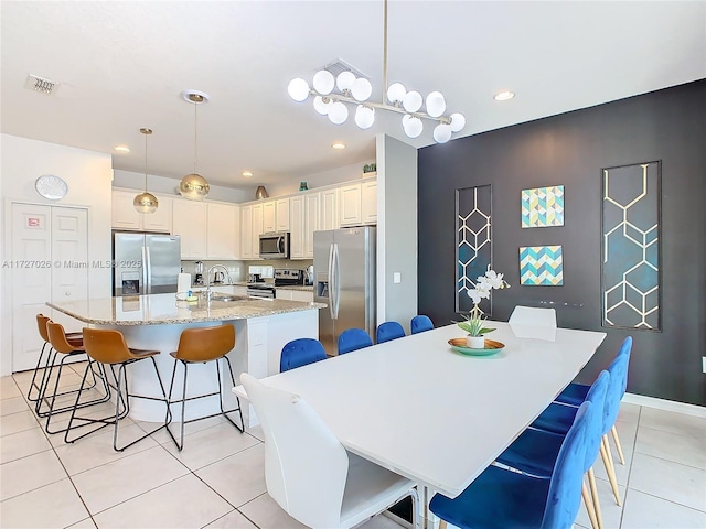 tiled dining area with sink