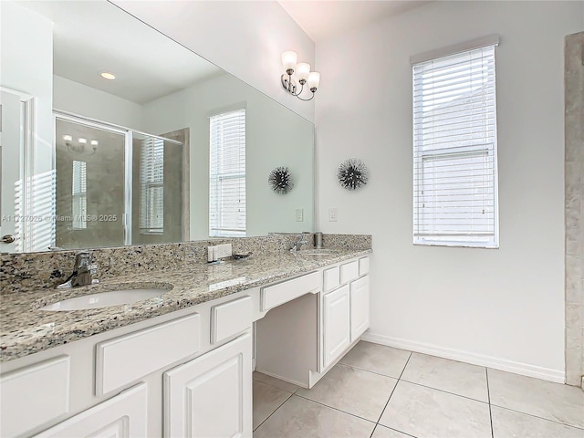 bathroom featuring an enclosed shower, a wealth of natural light, and tile patterned floors