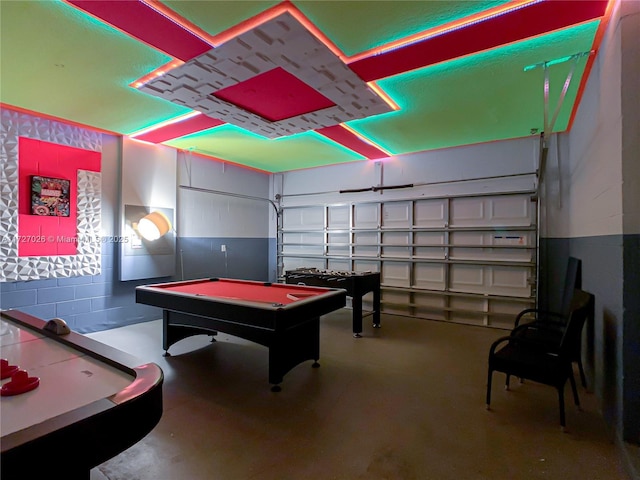 rec room featuring billiards and concrete flooring