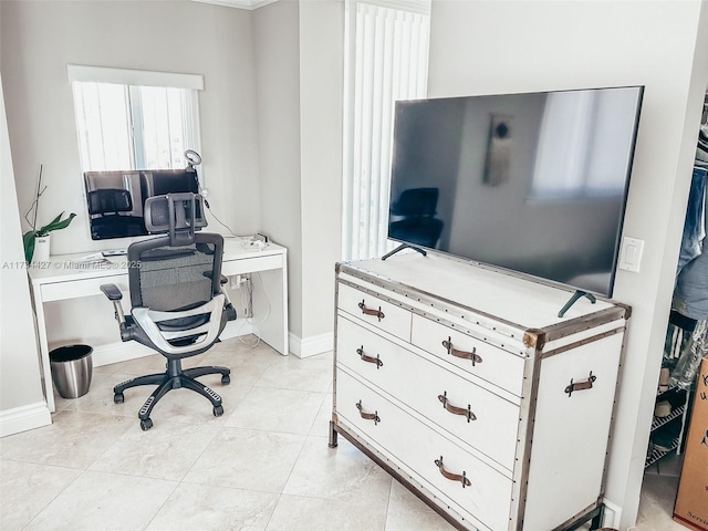 home office with light tile patterned floors