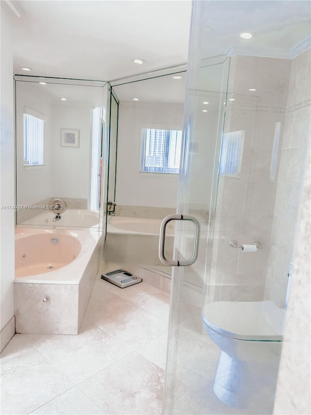 bathroom featuring separate shower and tub, tile patterned flooring, and toilet