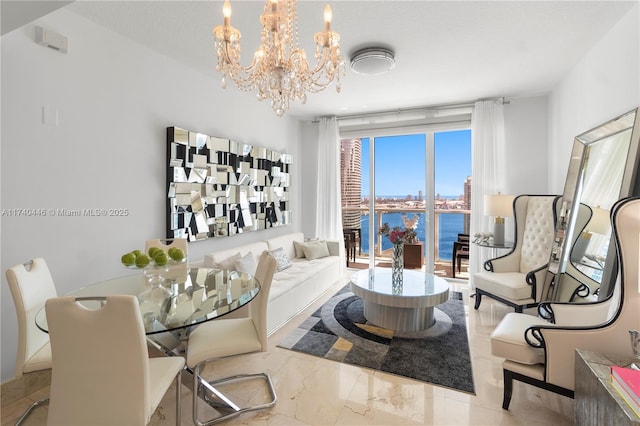 interior space with a water view and a notable chandelier