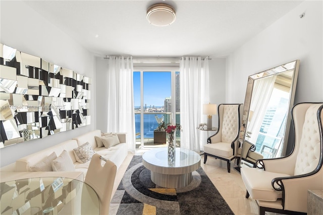 living room featuring a water view