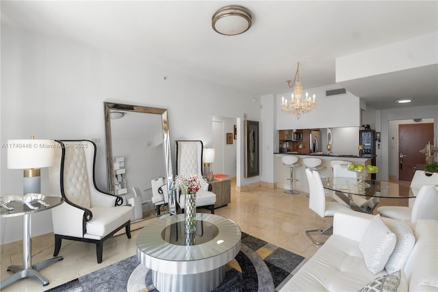 living room with an inviting chandelier