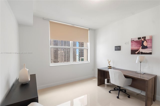 office area with light tile patterned floors