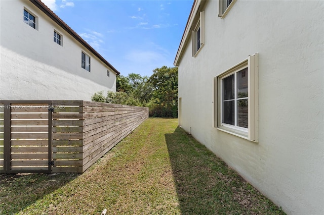 view of home's exterior featuring a lawn