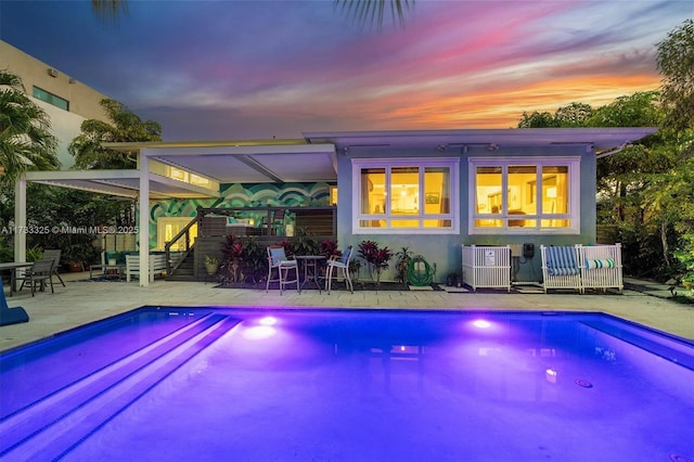 pool with a patio