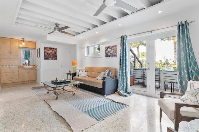 living room with french doors, beam ceiling, recessed lighting, a ceiling fan, and speckled floor