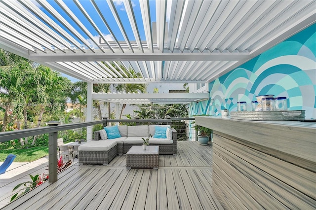 wooden terrace with outdoor lounge area and a pergola