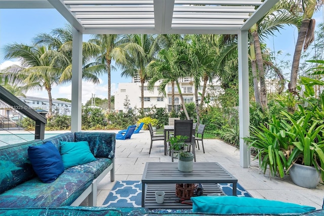 view of patio with outdoor dining area, an outdoor living space, and a pergola