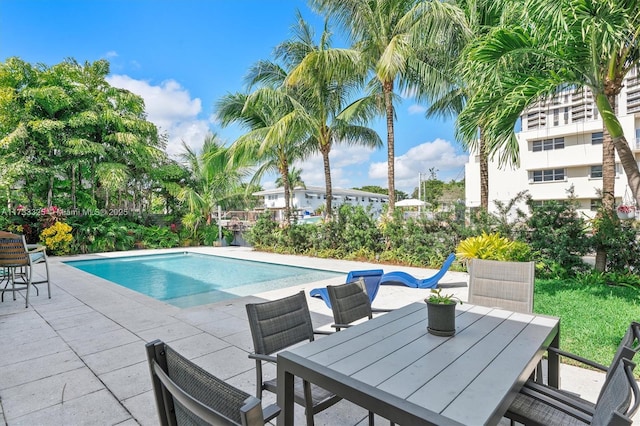 outdoor pool featuring a patio area