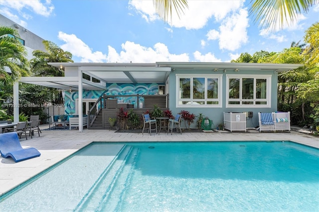 pool with stairs, a patio, fence, and central air condition unit