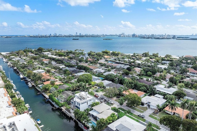 aerial view featuring a residential view and a water view