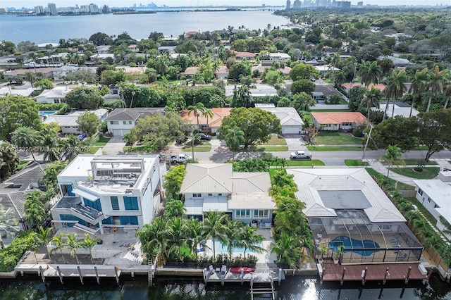 aerial view with a water view and a residential view