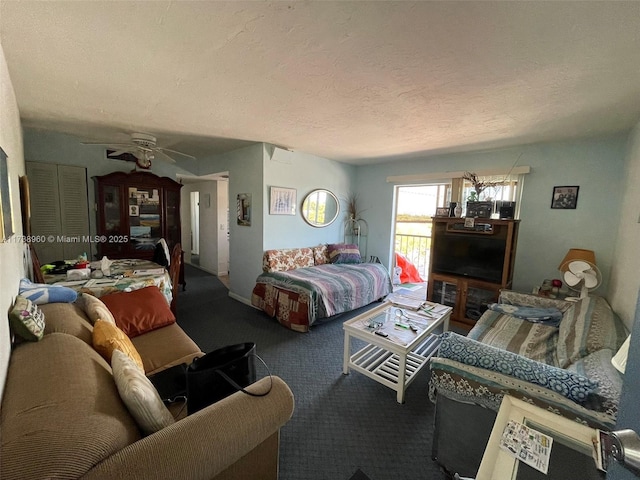 carpeted bedroom featuring a textured ceiling