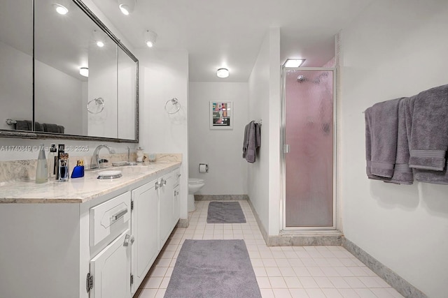 1865 S Ocean Dr Unit 4D, Hallandale Beach, FL 33009 - bathroom with vanity, tile patterned floors, toilet, and walk in shower