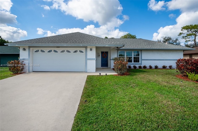 single story home featuring a garage and a front yard