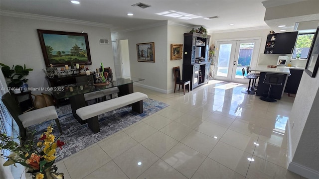 5051 NE 6th Ave, Deerfield Beach, FL 33064 - living room featuring french doors, ornamental molding, and light tile patterned flooring
