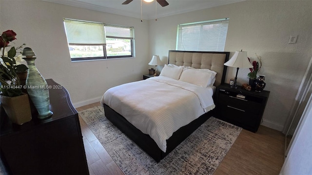 5051 NE 6th Ave, Deerfield Beach, FL 33064 - bedroom with hardwood / wood-style flooring, ornamental molding, and ceiling fan