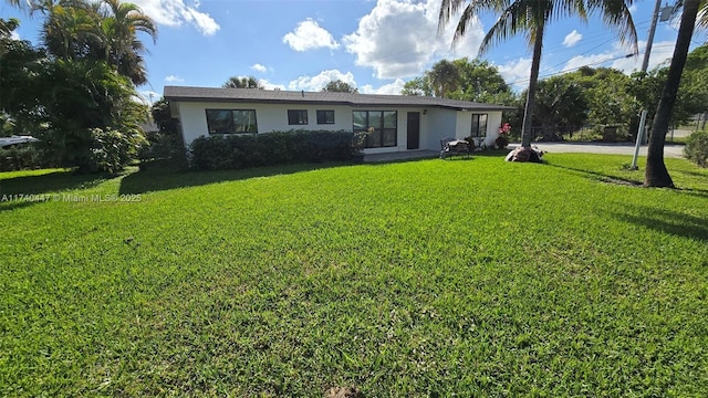 5051 NE 6th Ave, Deerfield Beach, FL 33064 - view of front of property featuring a front lawn
