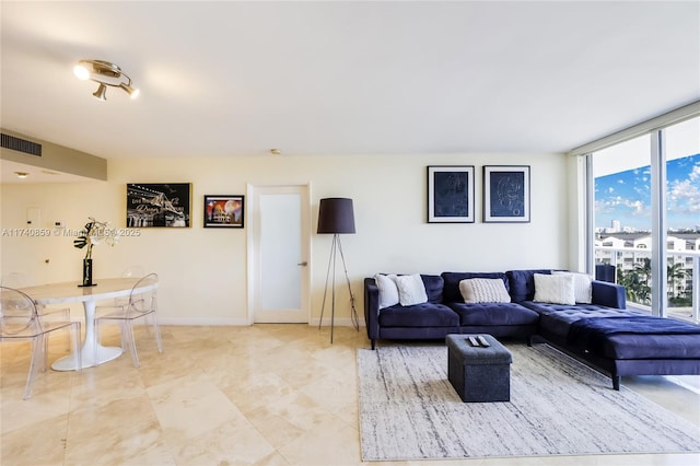 living room with a wall of windows