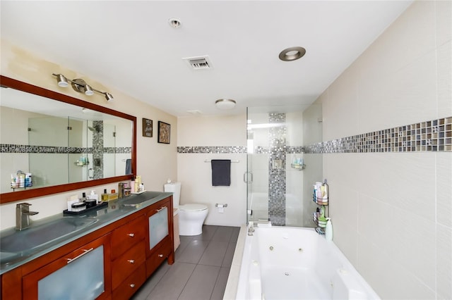 full bathroom with tile patterned floors, toilet, tile walls, vanity, and plus walk in shower