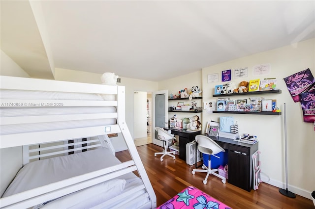 bedroom featuring dark hardwood / wood-style floors