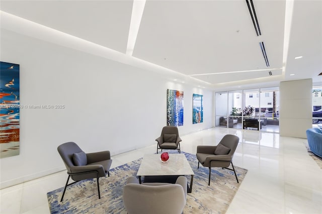 living room with light tile patterned floors