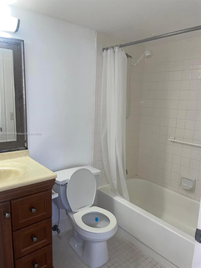 full bathroom featuring vanity, tile patterned floors, toilet, and shower / bathtub combination with curtain