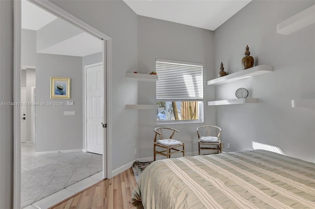 bedroom with light wood-type flooring