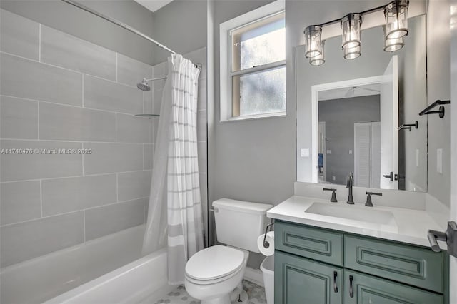 full bathroom with vanity, toilet, and shower / tub combo