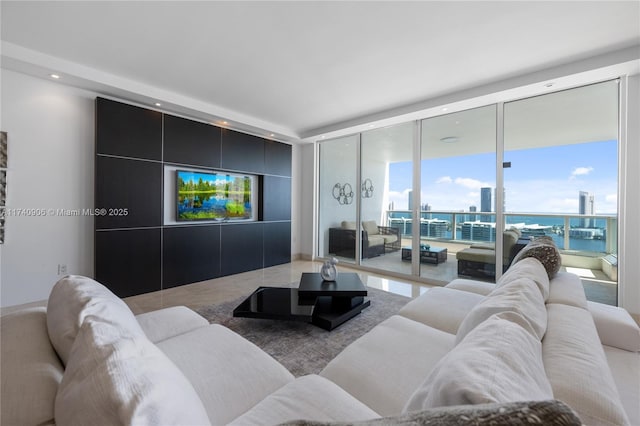 living room featuring recessed lighting and expansive windows