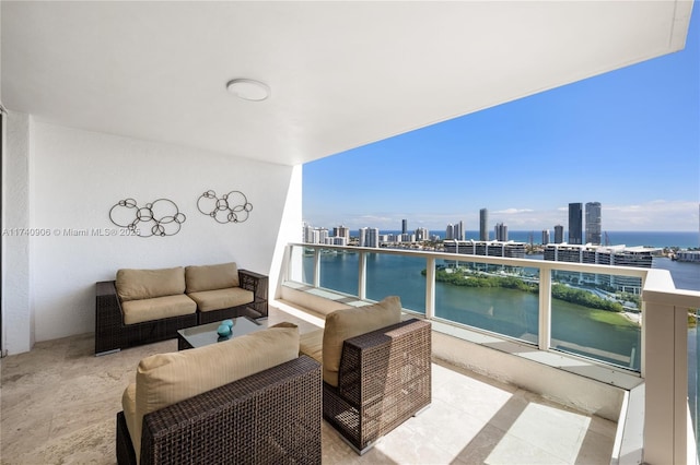 balcony with a water view, an outdoor living space, and a city view