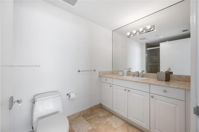 bathroom with visible vents, baseboards, toilet, vanity, and a shower stall