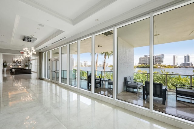 lobby featuring a water view and a city view